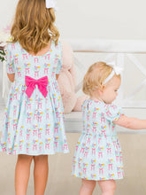 Load image into Gallery viewer, Baby Girls Bows and Bouquets Knit Puff Sleeve Skirted Romper
